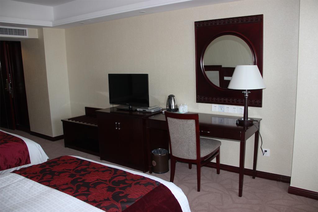 Dalian Southern Airline Pearl Hotel Habitación foto