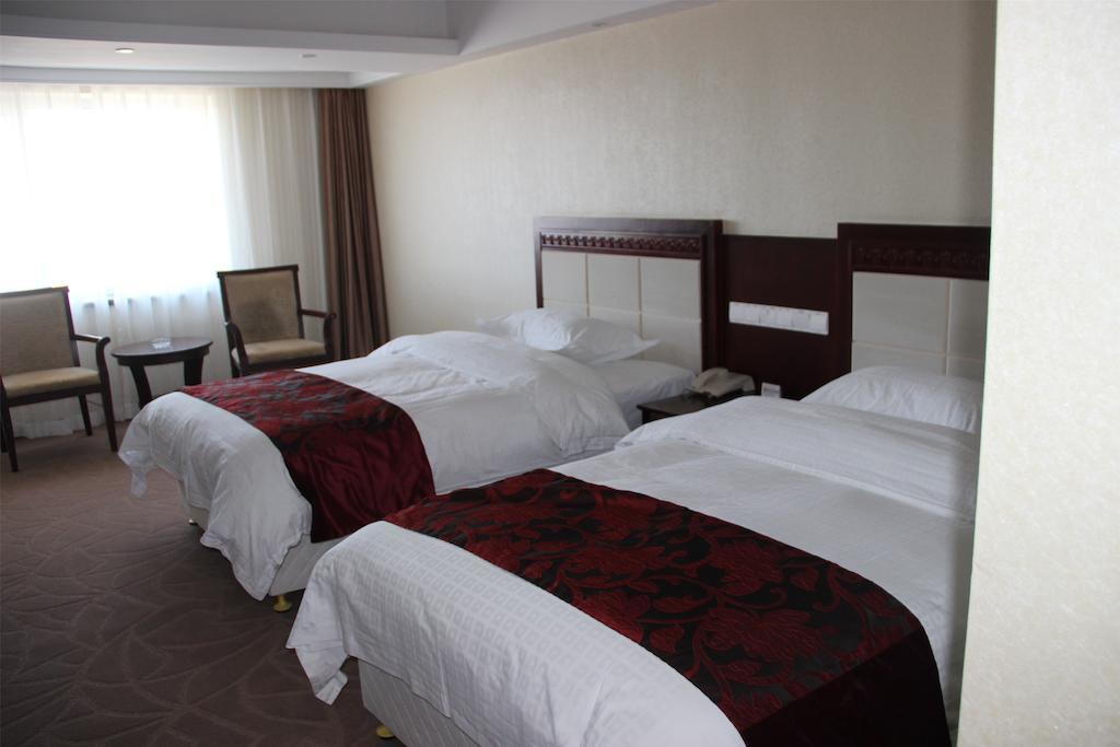 Dalian Southern Airline Pearl Hotel Habitación foto