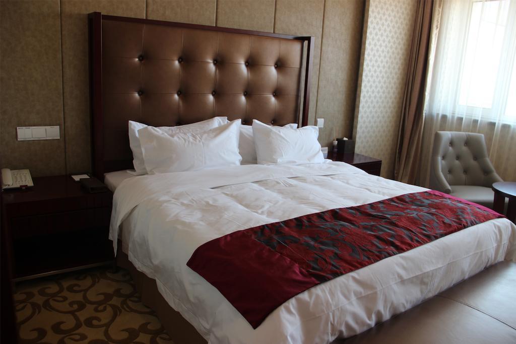 Dalian Southern Airline Pearl Hotel Habitación foto