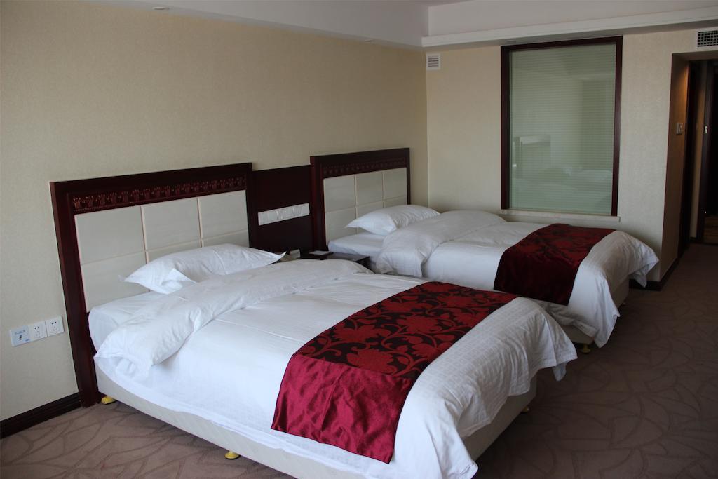 Dalian Southern Airline Pearl Hotel Habitación foto